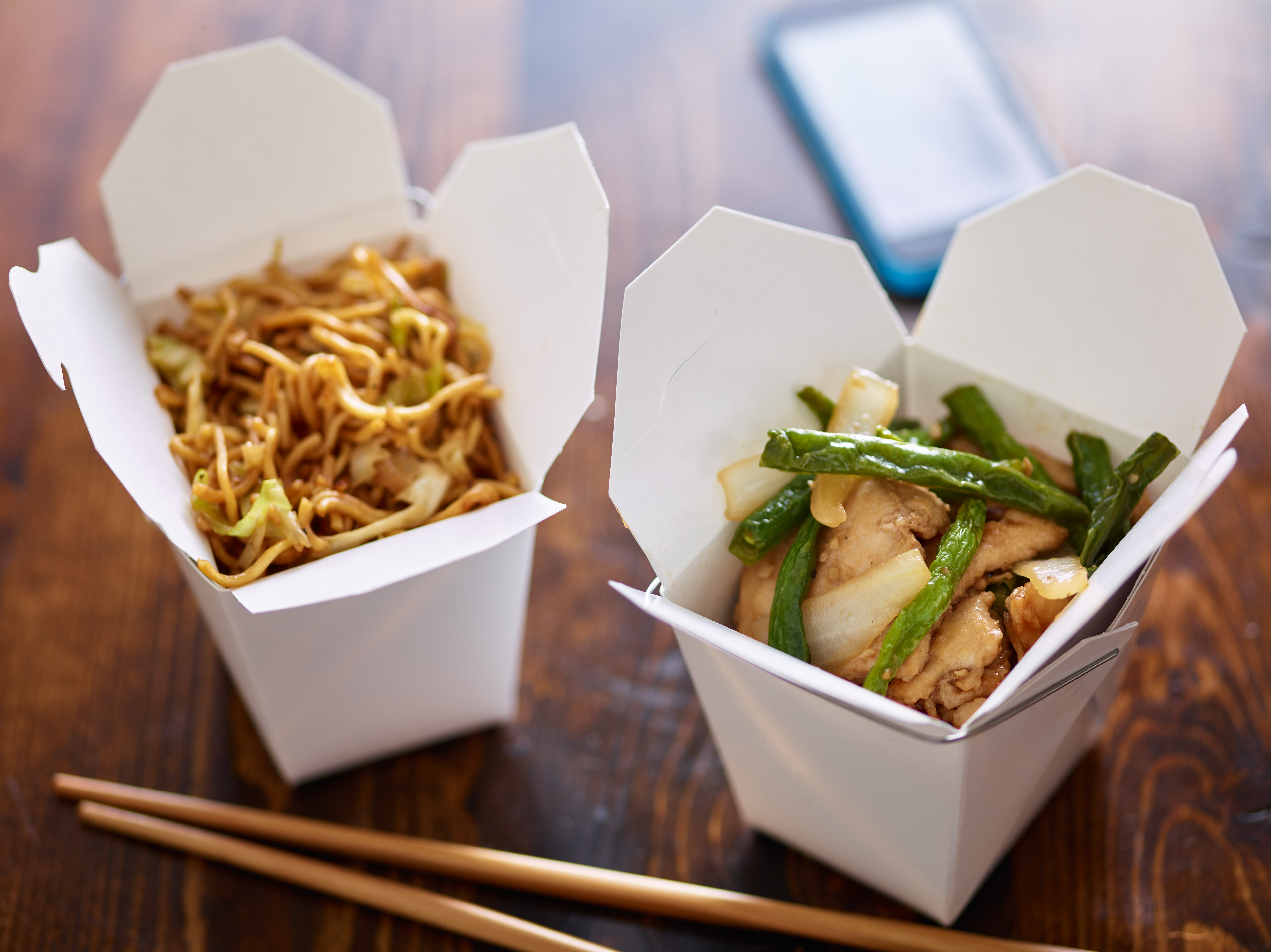 Flow Wrap Packaging - chinese take out in boxes with chopsticks and phon 2025 04 01 15 10 36 utc