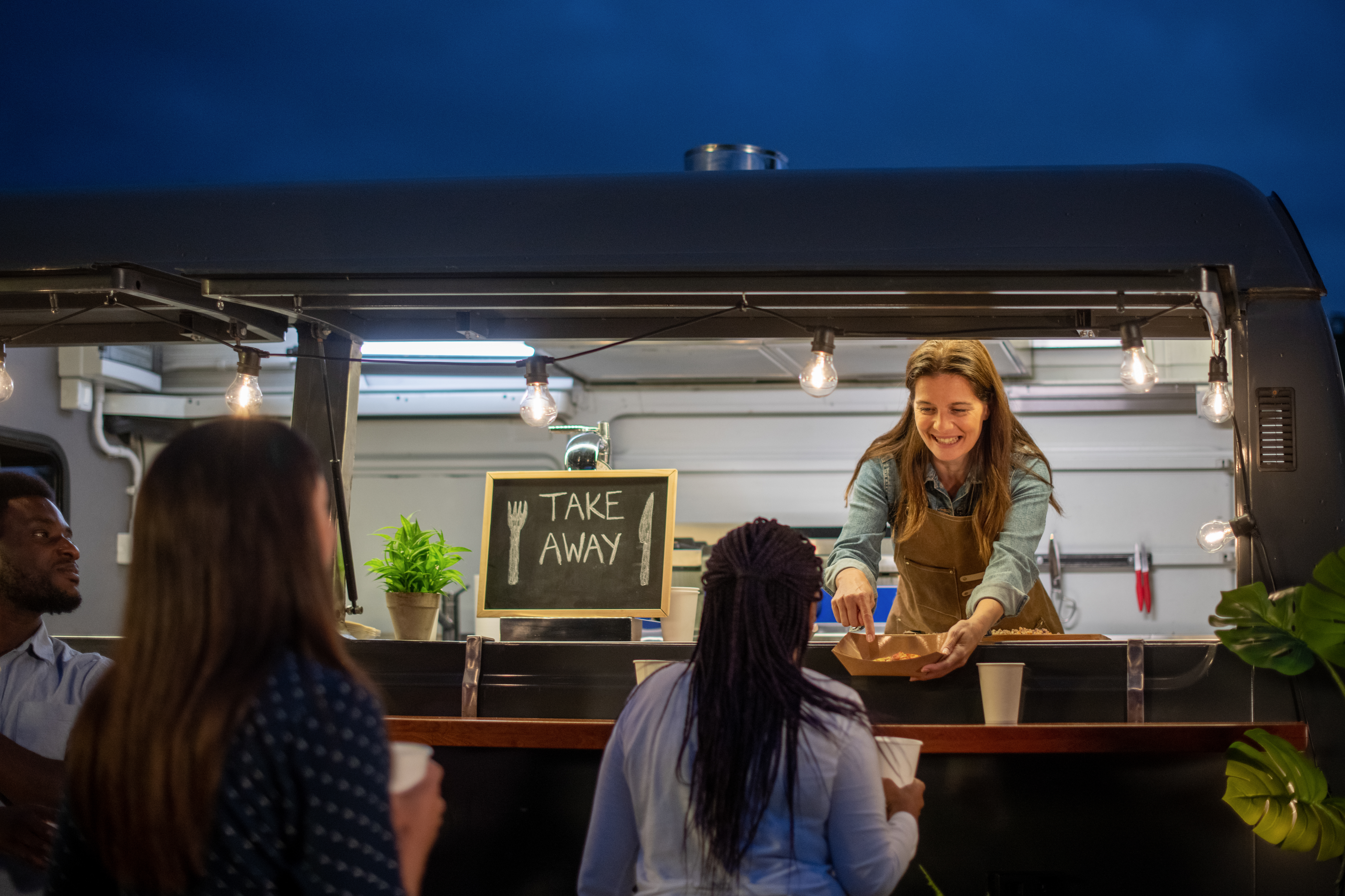 Flow Wrap Packaging - happy diverse women working in cafe 2025 01 08 04 45 30 utc